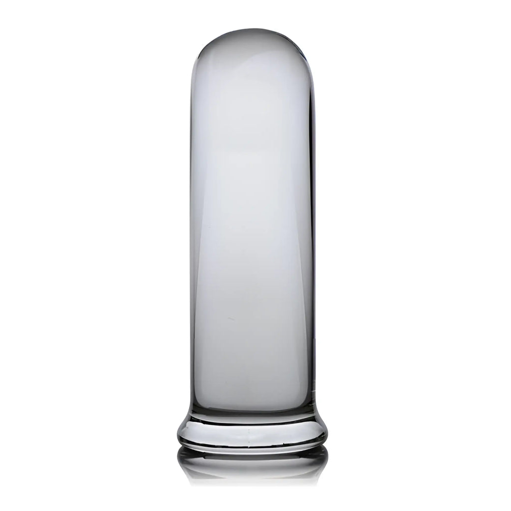 Prisms Erotic Glass Pillar Large: A smooth, transparent glass cylinder with a rounded tip and a flat base.