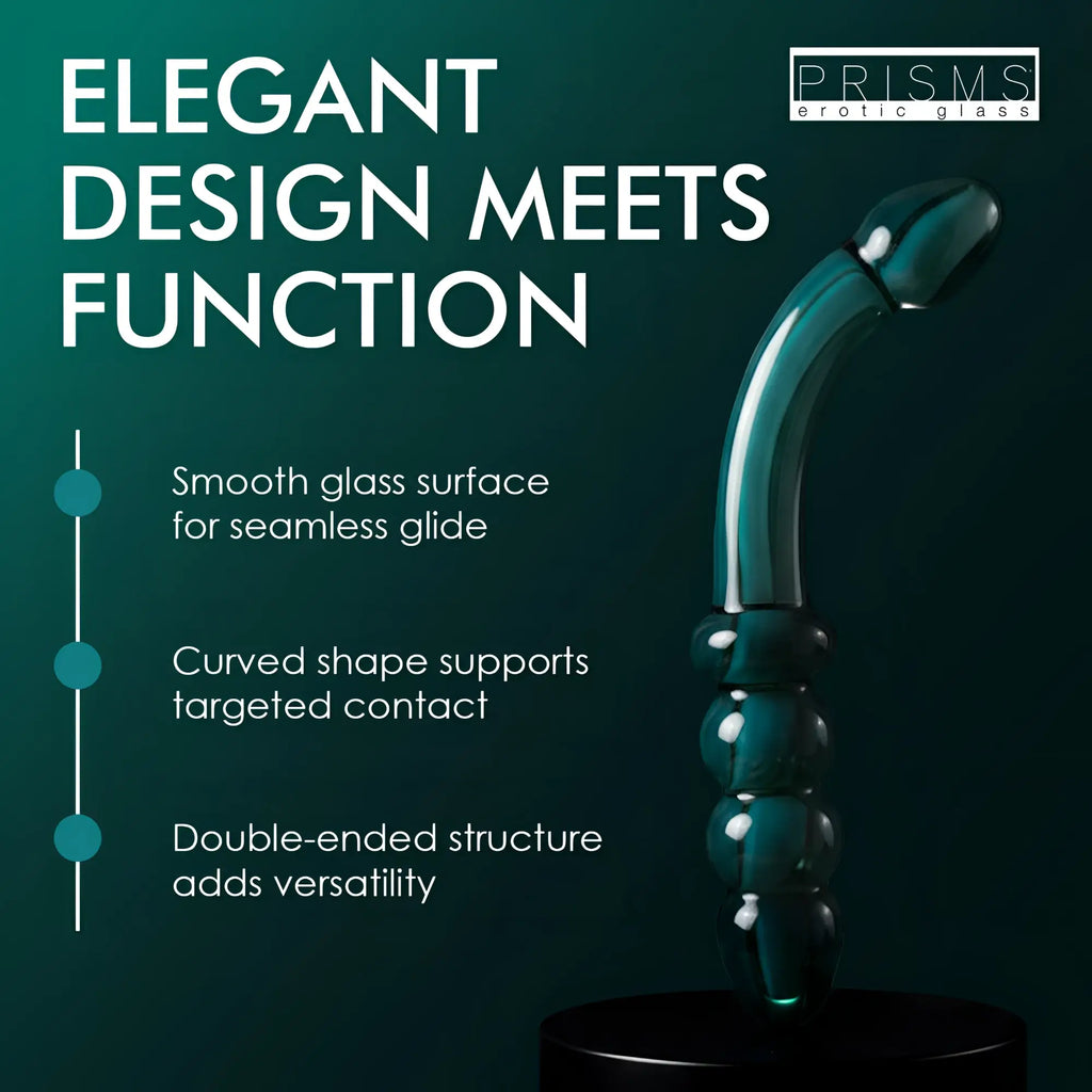 Prisms Erotic Glass Smoky Jade curved glass dildo with a segmented, double-ended design on a dark green background.