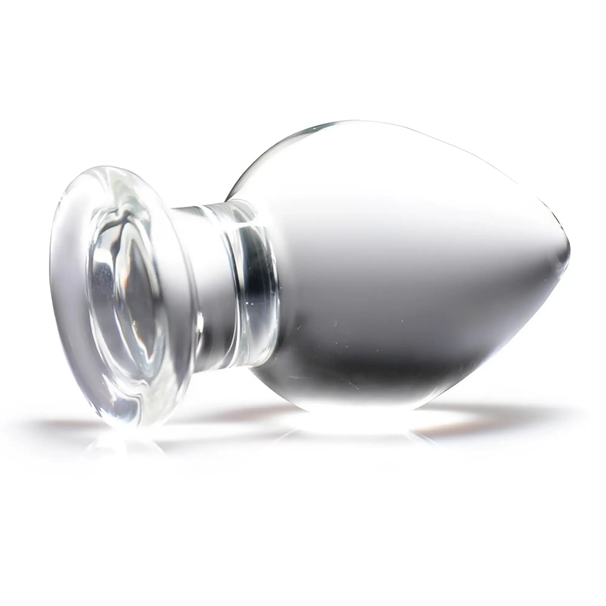 Prisms Erotic clear glass butt plug with a smooth, bulbous shape and a wide, flared base against a white background.
