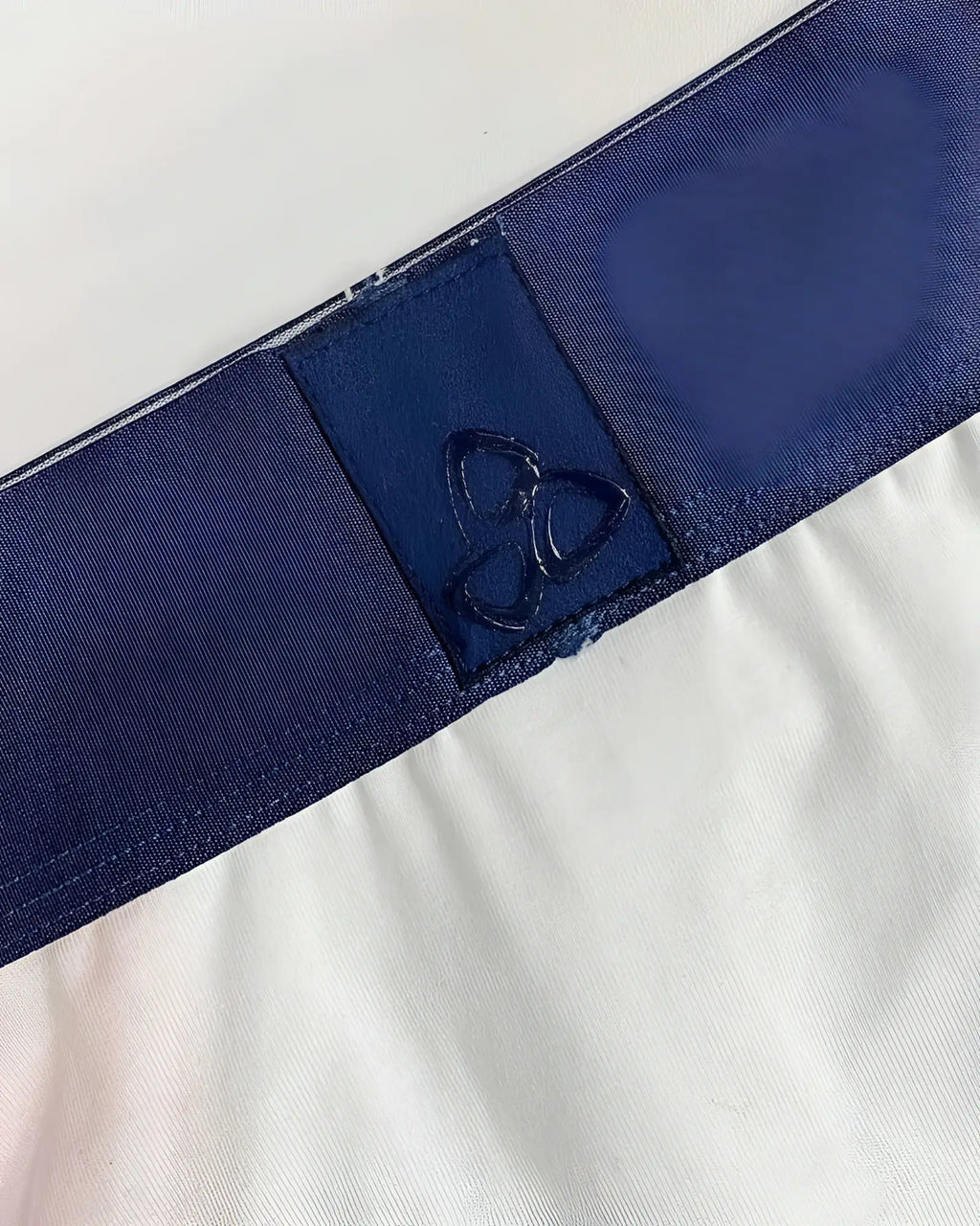 Private structure baut4388 athlete mini briefs in white with dark blue elastic waistband and subtle embroidered logo patch