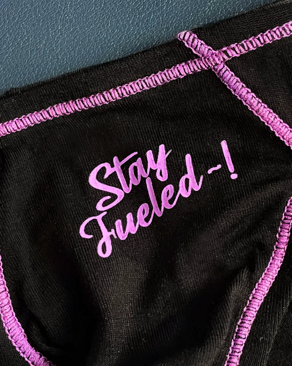 Black private structure epus4563 prime eutopia bikini brief in charcoal with vibrant pink stay fueled embroidered script
