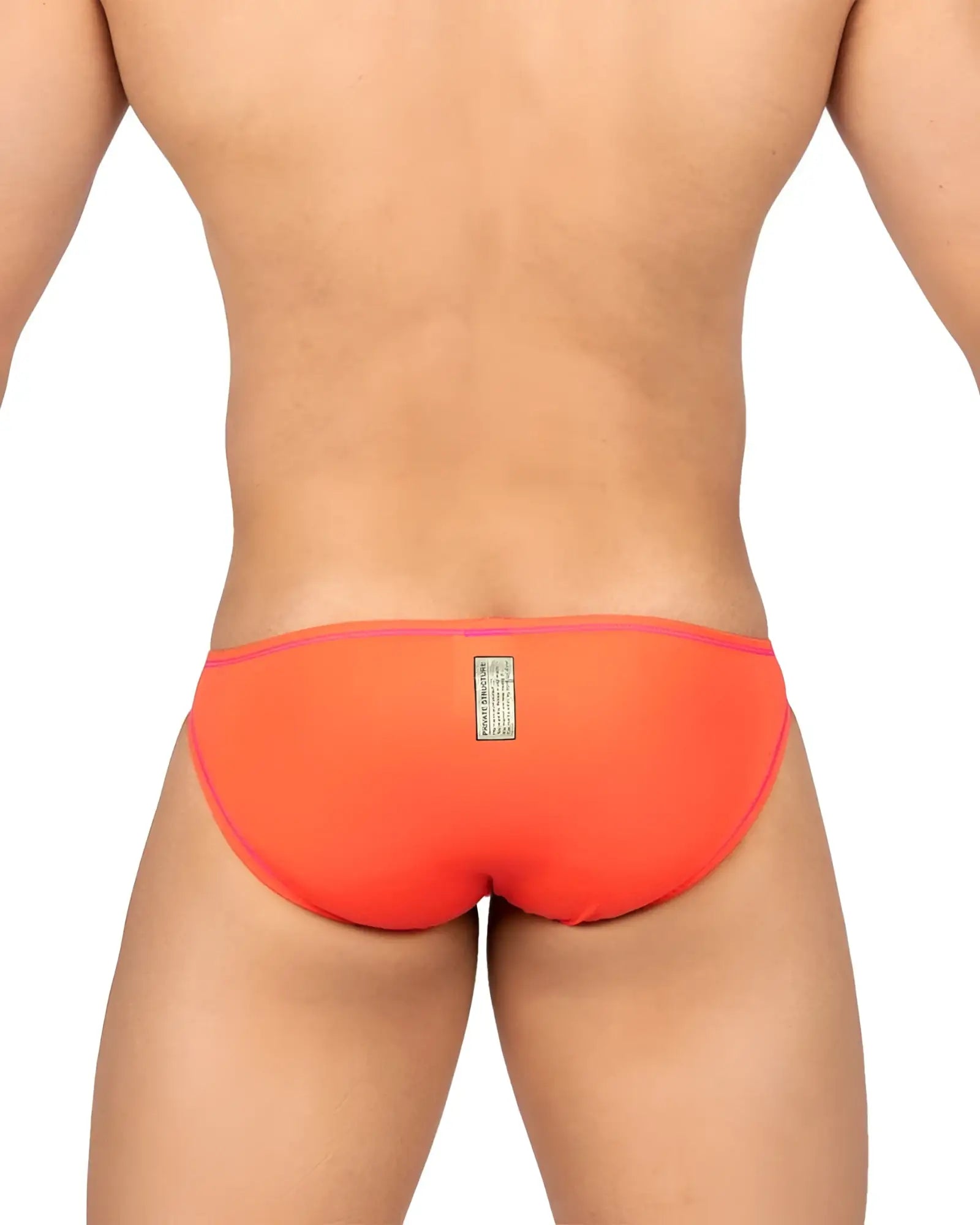 Back view of vibrant orange private structure epus4563 prime eutopia bikini brief with pink trim and label