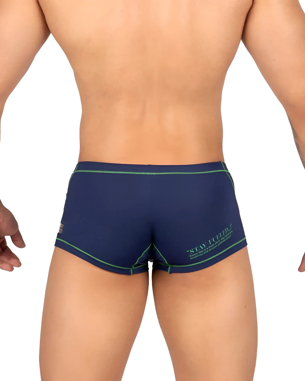 Back view of private structure epu s4570 prime elysian hipster navy blue swim trunks with green trim and stay firm logo
