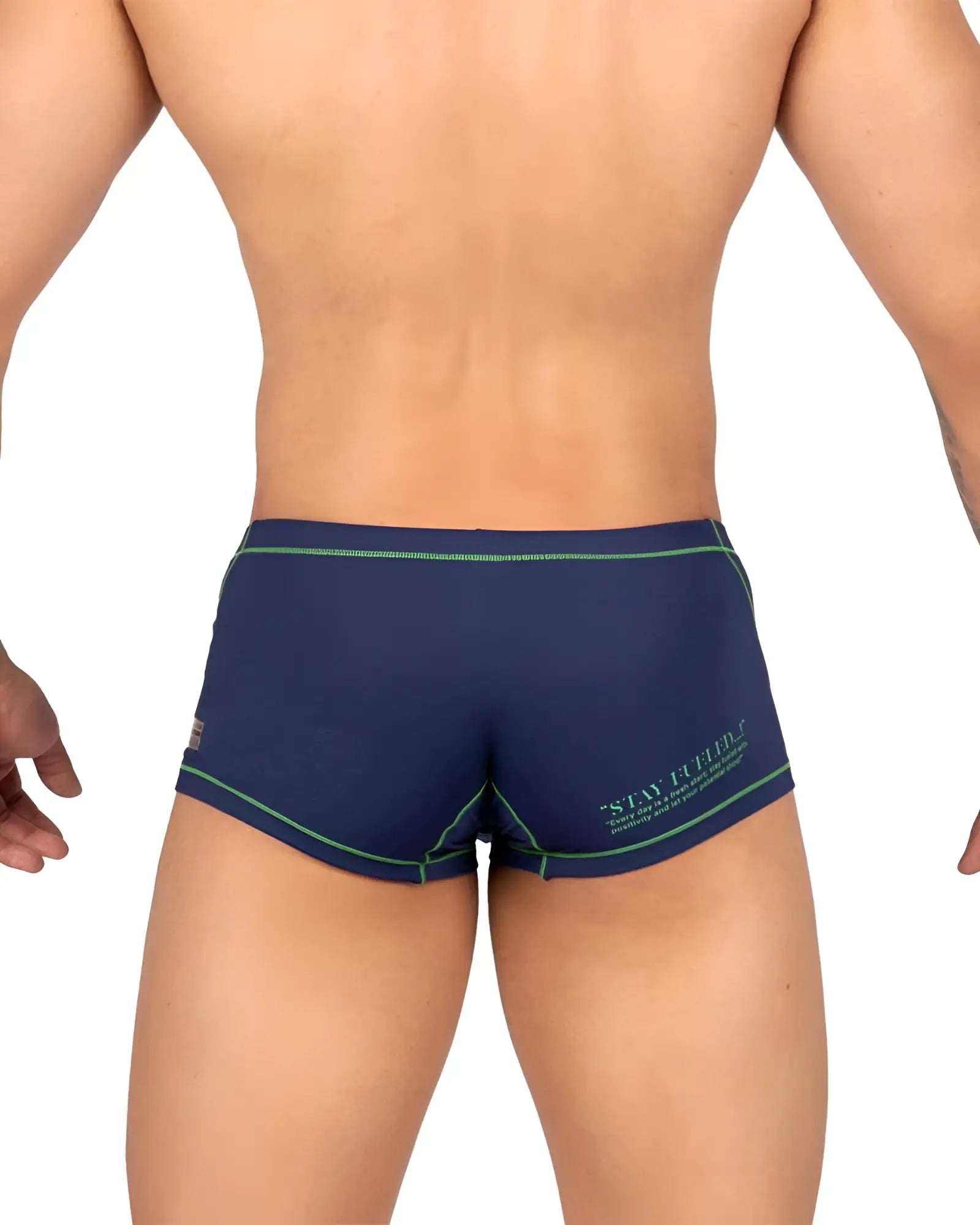 Back view of private structure epu s4570 prime elysian hipster navy blue swim trunks with green trim and stay firm logo