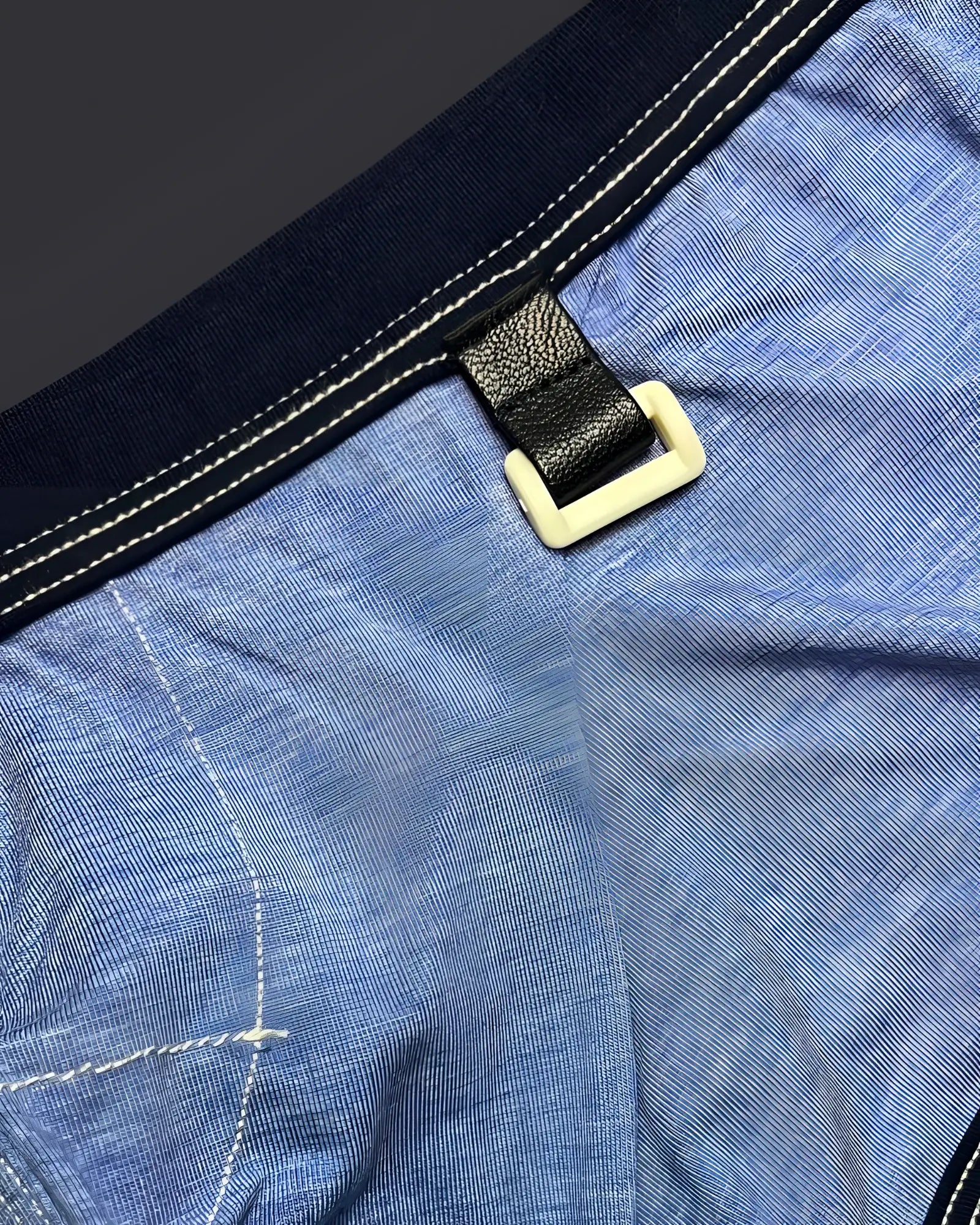 Private structure lcut4359 barn boy low rise denim trunk with black leather strap and cream plastic buckle on blue denim