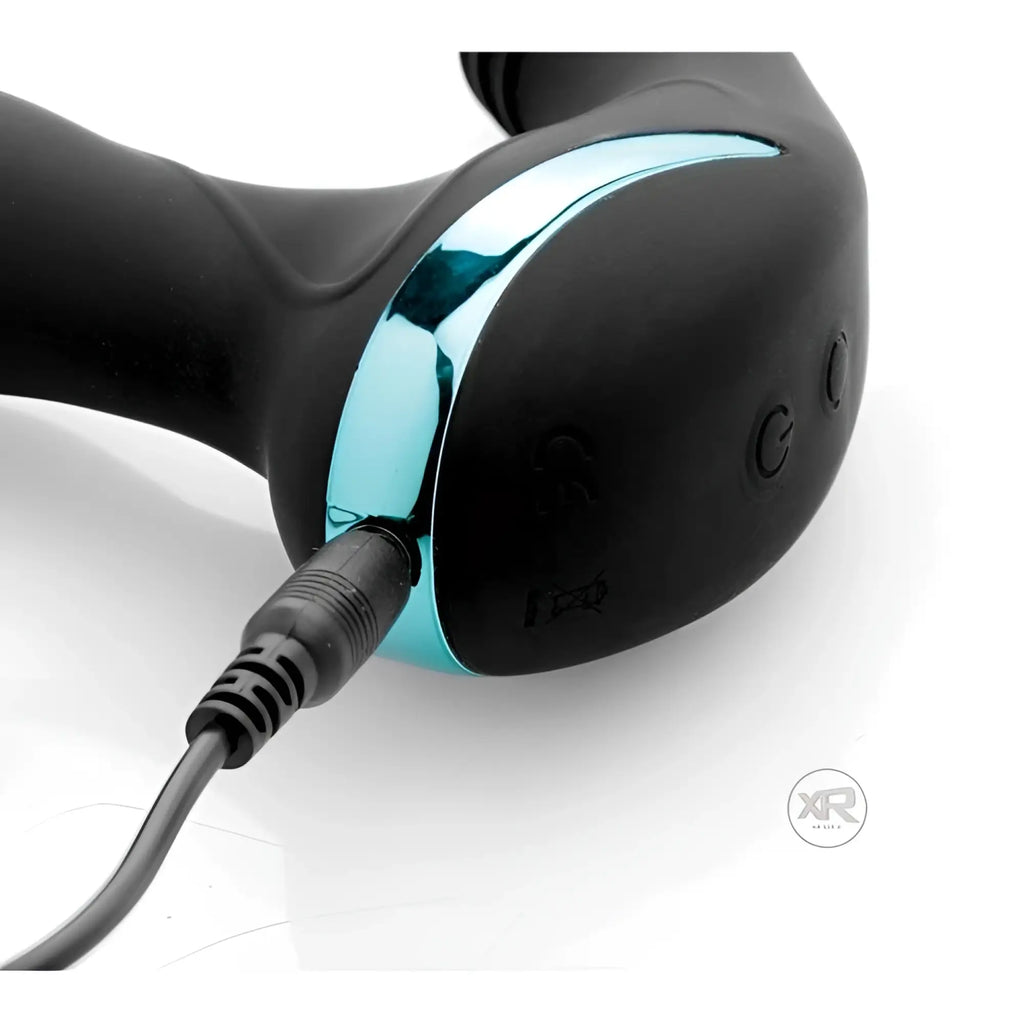 Prostatic Play Maverick black silicone prostate stimulator with a metallic blue accent and charging cable.