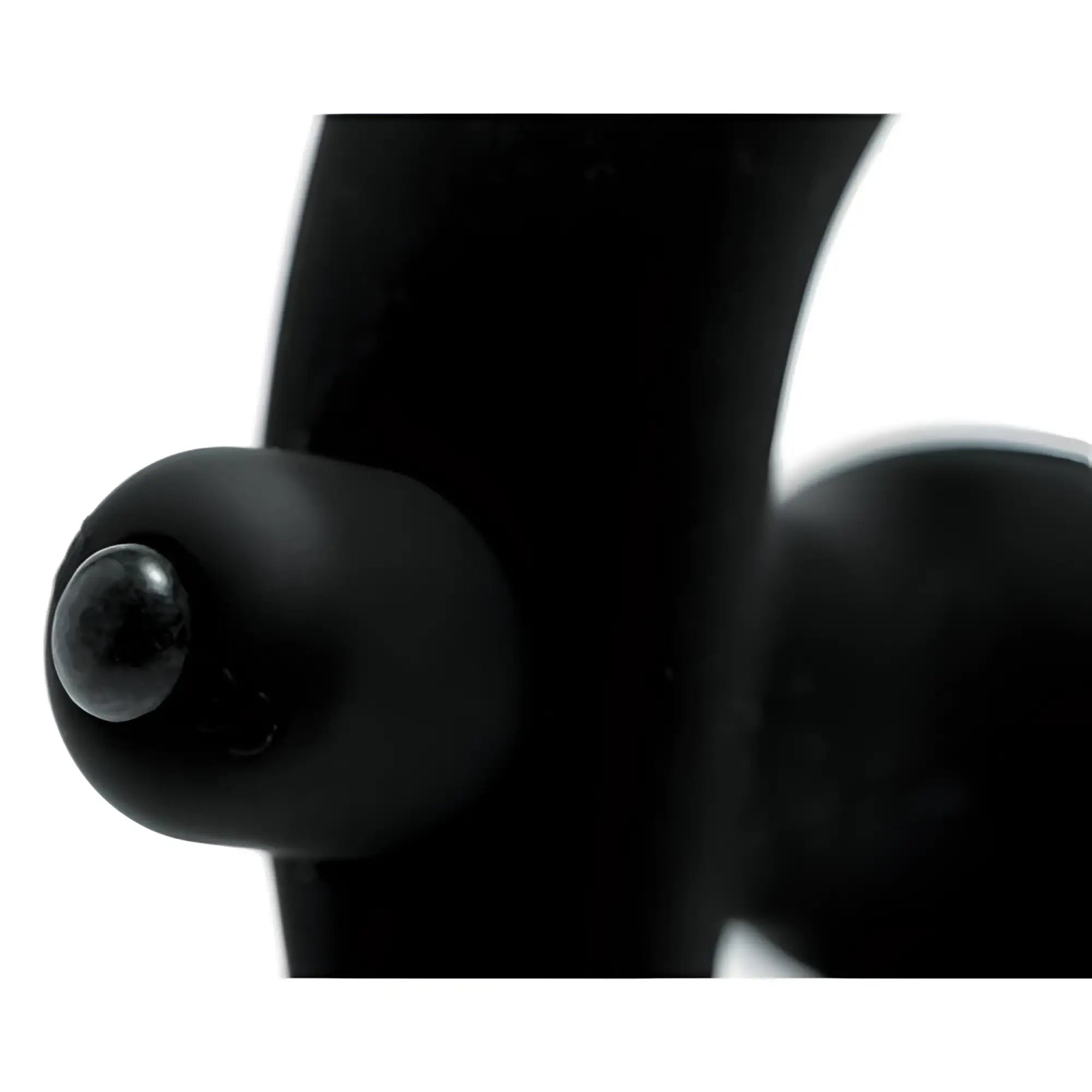 Prostatic Play Nomad Silicone Prostate Vibe in matte black, showing a close-up of its curved, bulbous design.