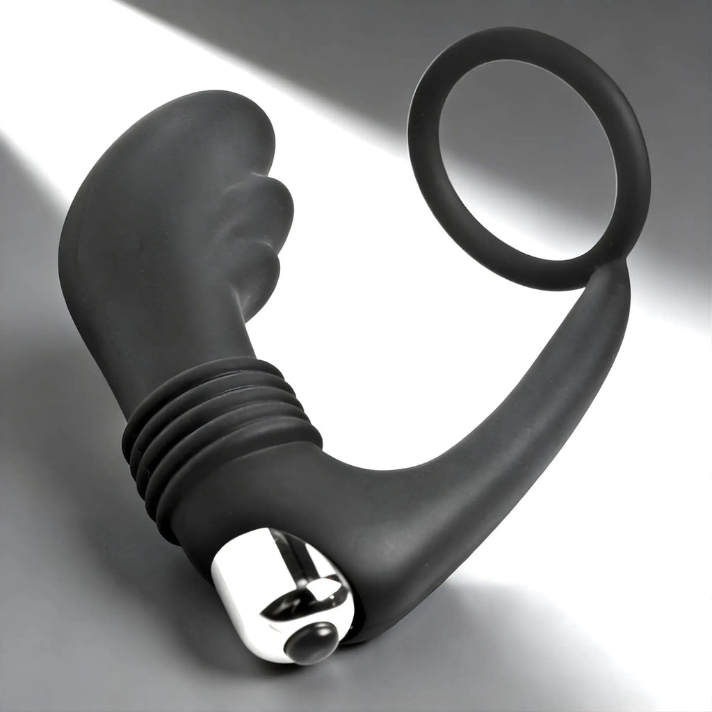 Prostatic Play Nova black silicone cock ring and prostate vibe with a silver metallic base against a white background.