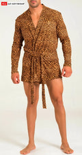 A man wearing a leopard print long sleeve robe with tied waistband in the prowl cheetah robe design