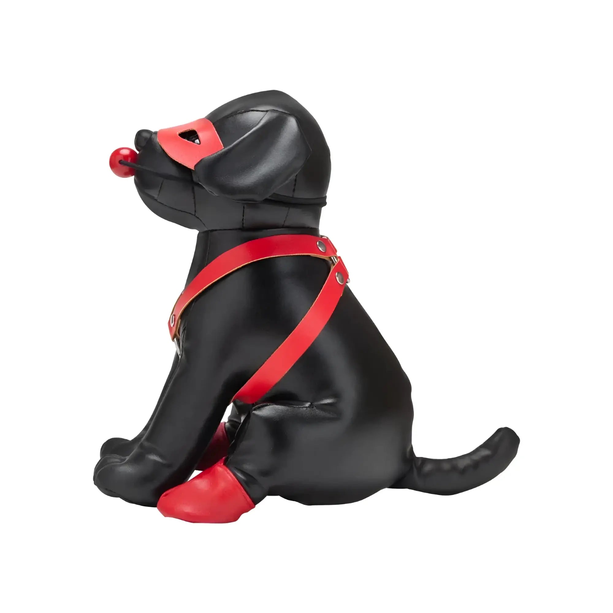 Black faux leather puppy figurine wearing red harness muzzle and paw covers named prowler red puppy booted up bandit