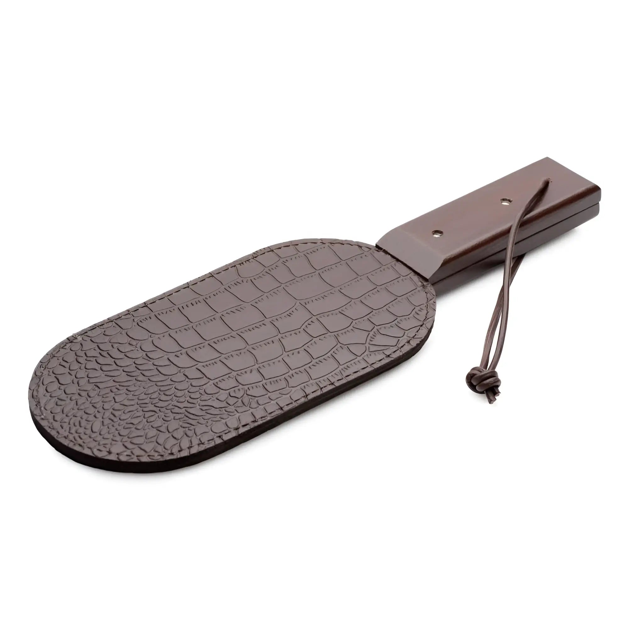 Brown crocodile-embossed leather puppy paw paddle cover with wooden handle and matching drawstring pouch