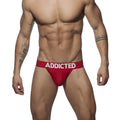 Red push-up mesh jockstrap briefs with a bold white addicted logo on the waistband
