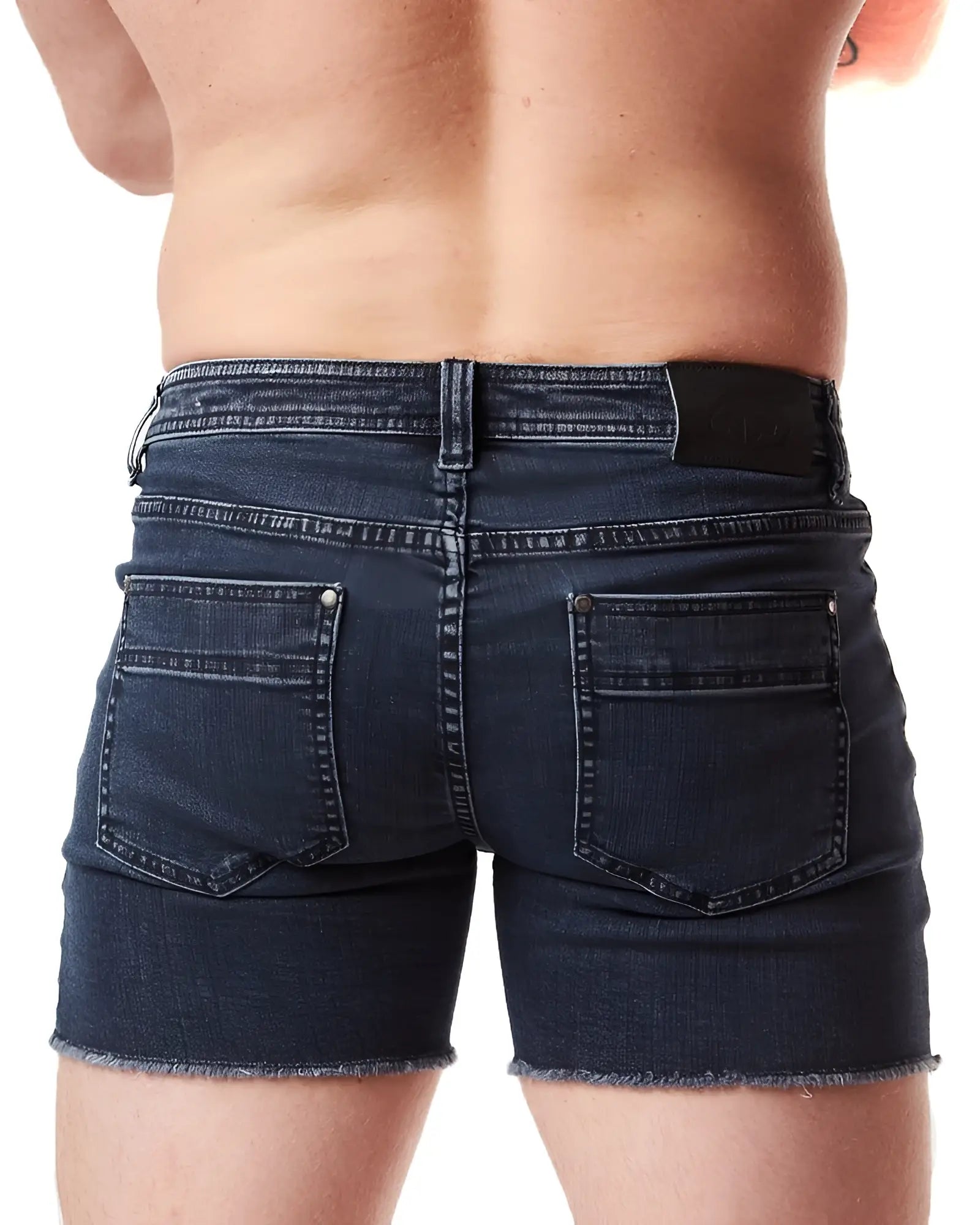 Dark blue denim quad short with frayed hem and back pockets showing the back side of the product
