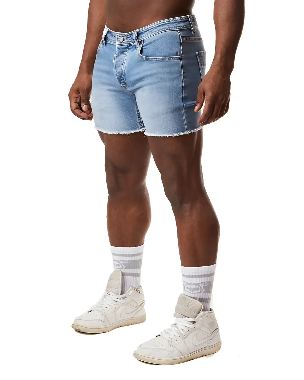Light-wash denim quad shorts with a frayed hem and classic five-pocket design visible from the front