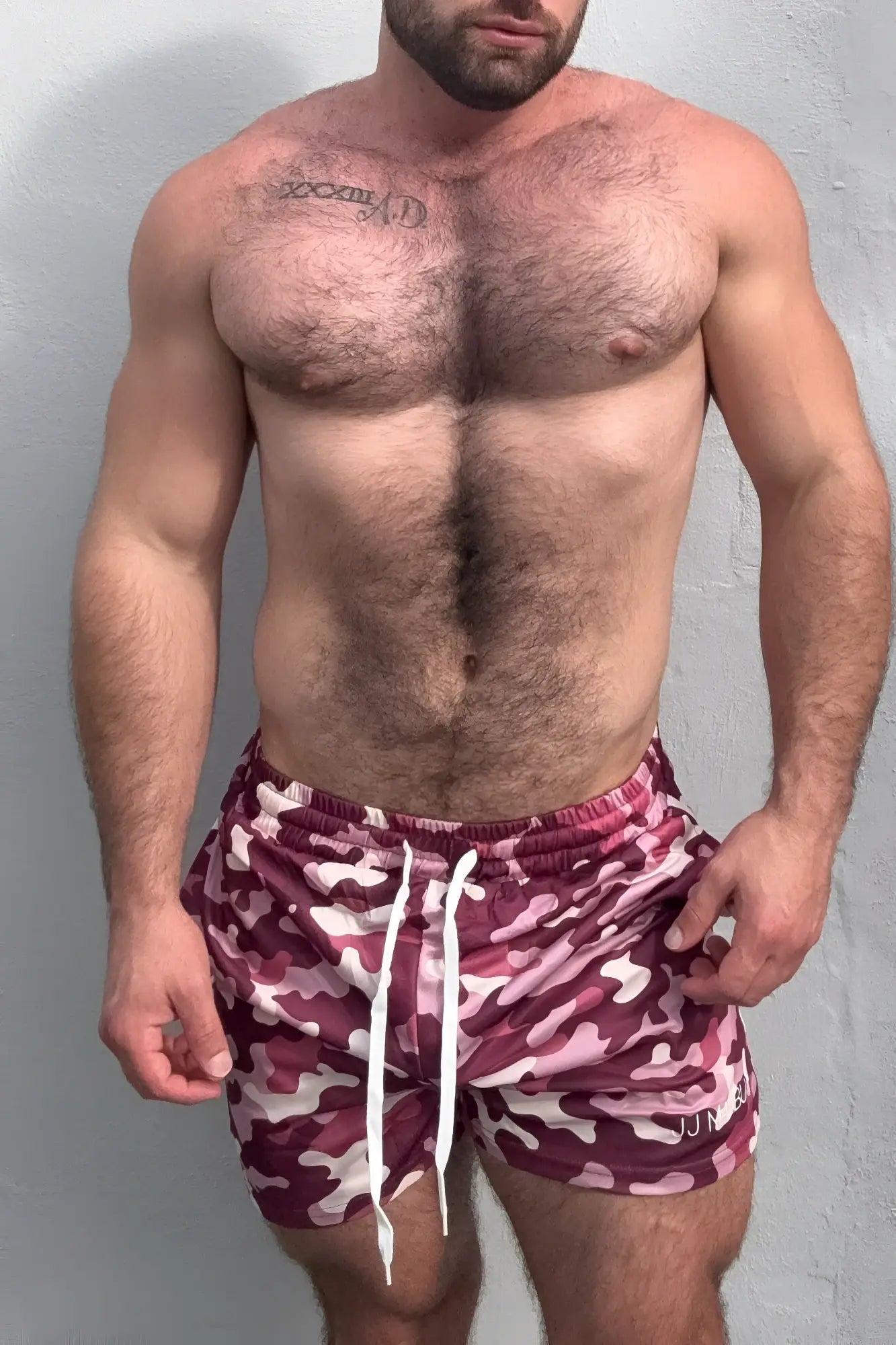 Maroon and pink camouflage quick-dry mesh shorts with white drawstrings for swimwear and active use