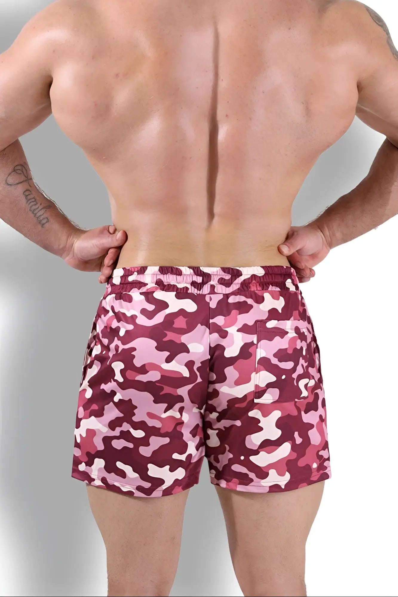 Quick-dry mesh shorts in pink and maroon purple camo with elastic waistband designed for swimwear use