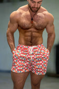 Men’s quick-dry mesh shorts with colorful geometric pattern and white drawstring designed for swimming and beachwear