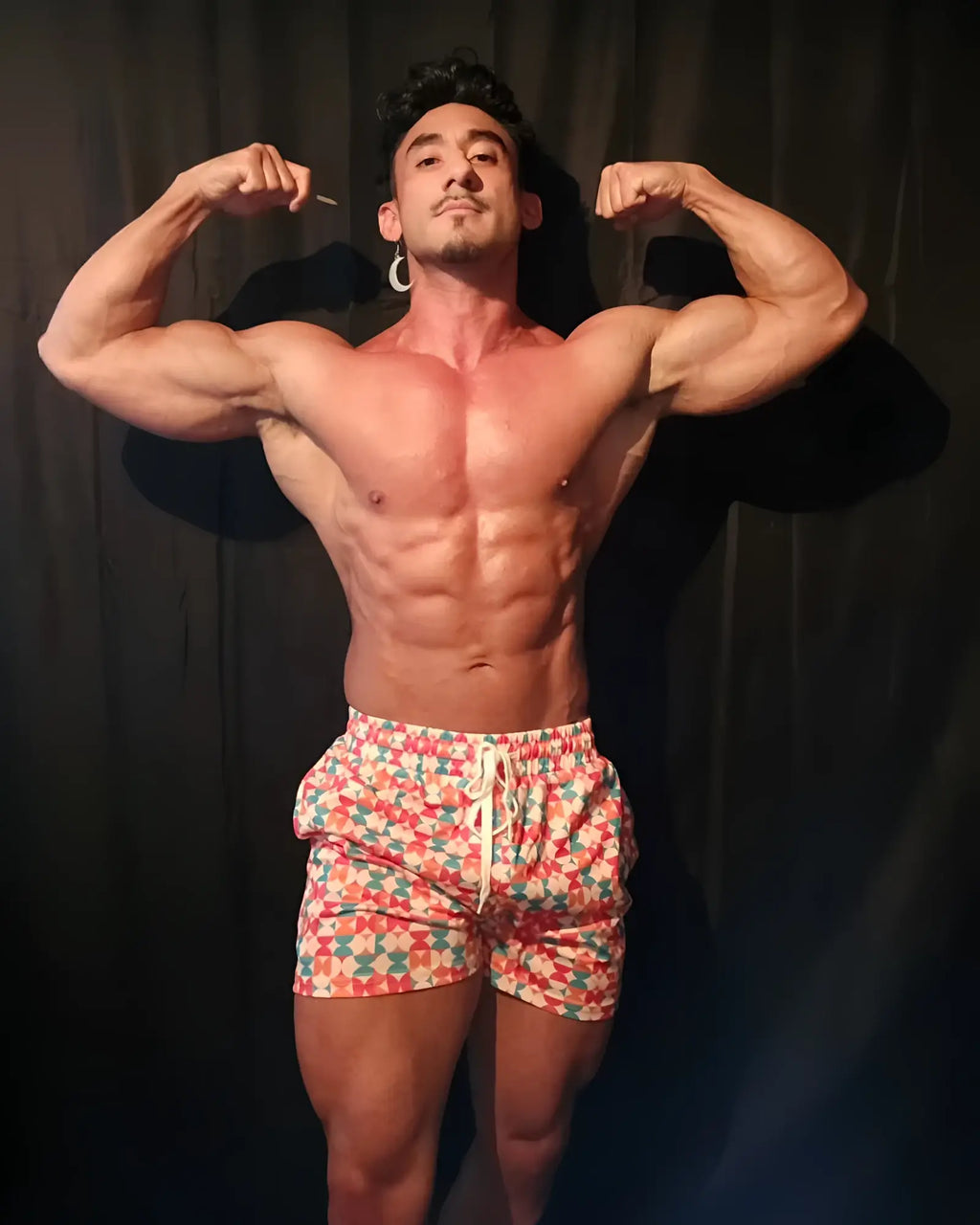 Quick-dry mesh shorts with red green and white geometric patterned swim trunks designed for retro style