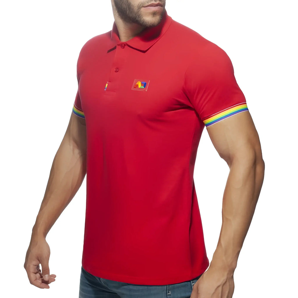 Red men’s polo shirt with rainbow trim on sleeves and a small colorful logo patch on the chest