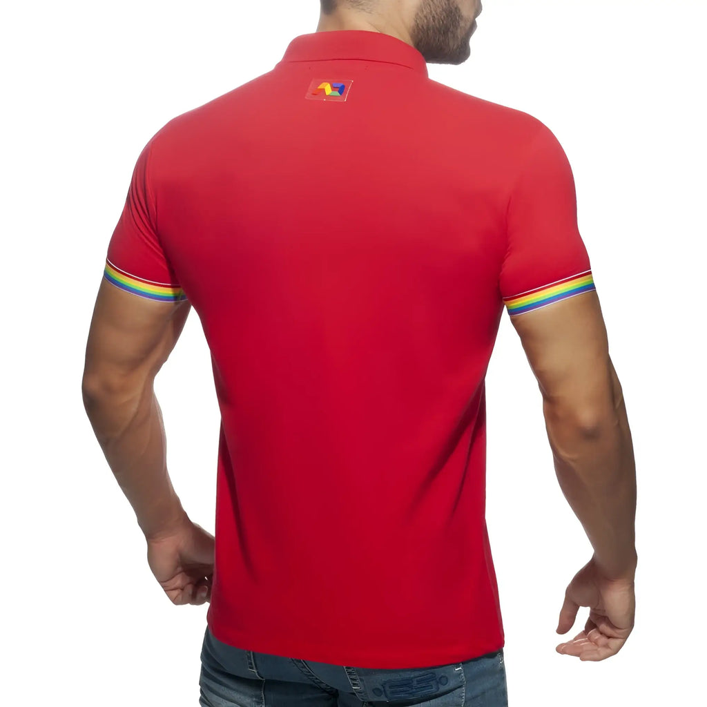 Red short-sleeved rainbow polo shirt with rainbow-striped cuffs and a colorful collar logo for casual wear