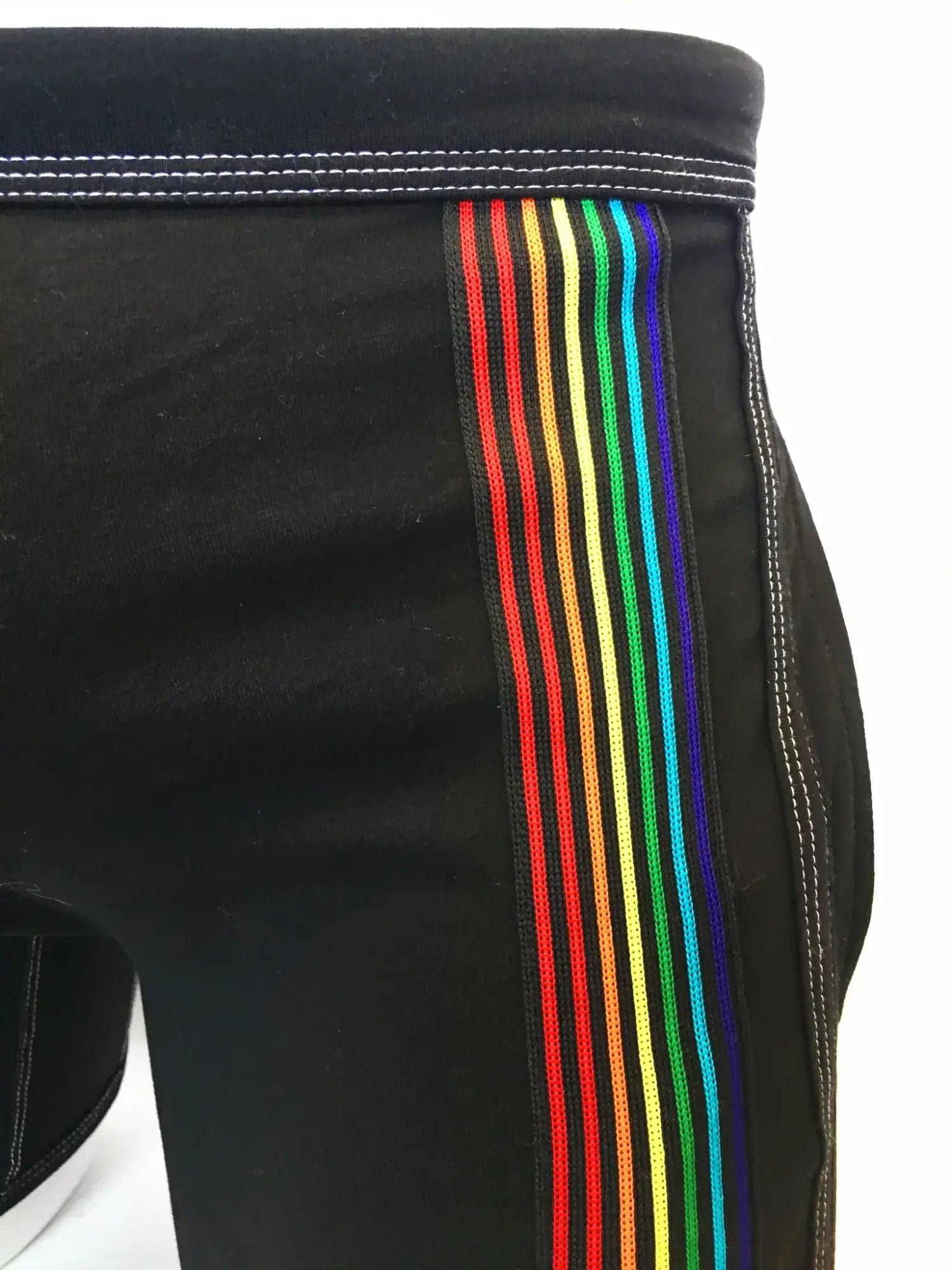 Black athletic shorts with a vibrant rainbow stripe down the side made from breathable fabric for active use