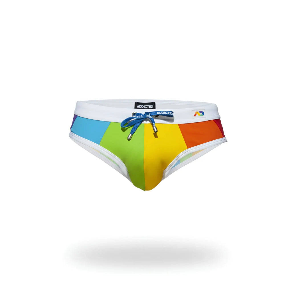 Rainbow swim brief with rainbow-striped vibrant blue green yellow and red panels white waistband and blue drawstring