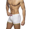 White cotton swim trunks with rainbow tape trim and red drawstring for casual summer wear