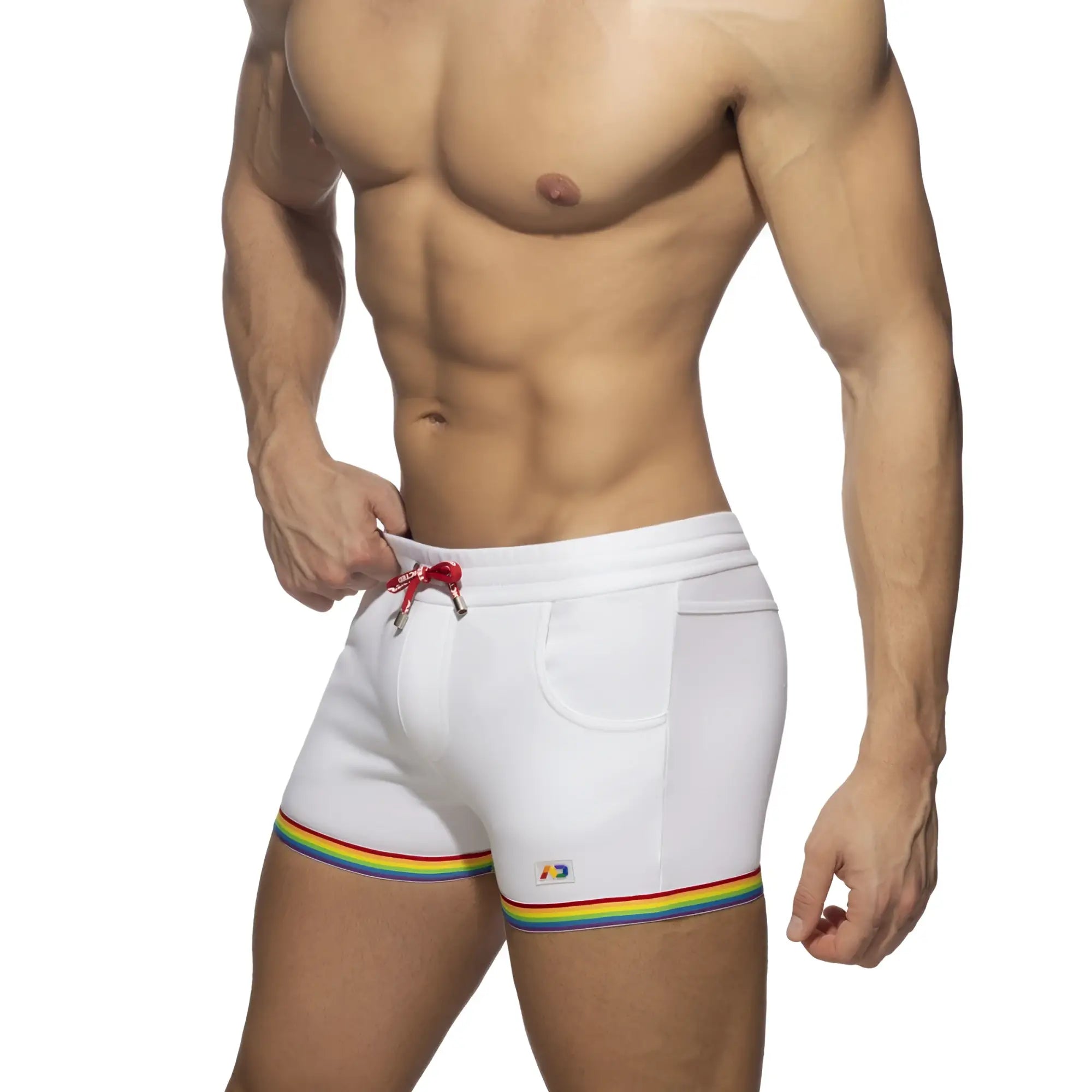 White cotton swim trunks with rainbow tape trim and red drawstring for casual summer wear