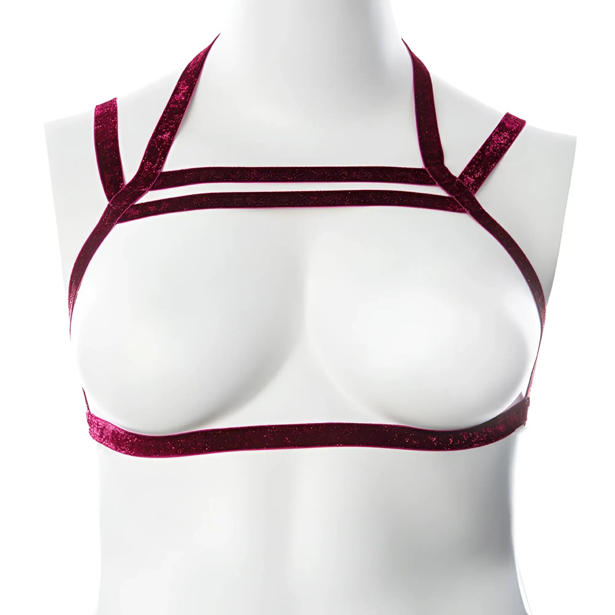 A shimmering burgundy velvet gender fluid harness top with a strappy crisscross design in raspberry glitter s-l