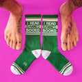Green crew socks with white accents and bold i read banned books text featuring ribbed texture and reinforced toes