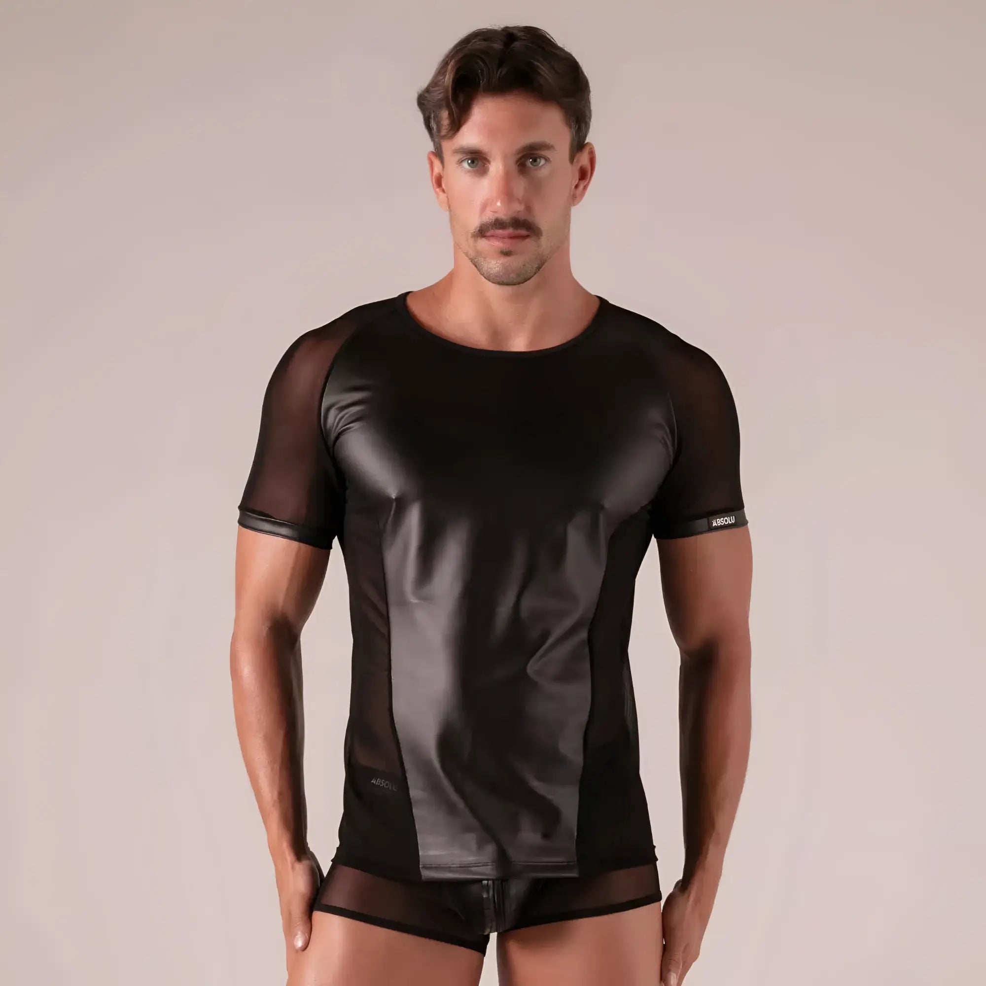 Black mesh and faux leather rebel t-shirt with short sleeves and a sleek modern design