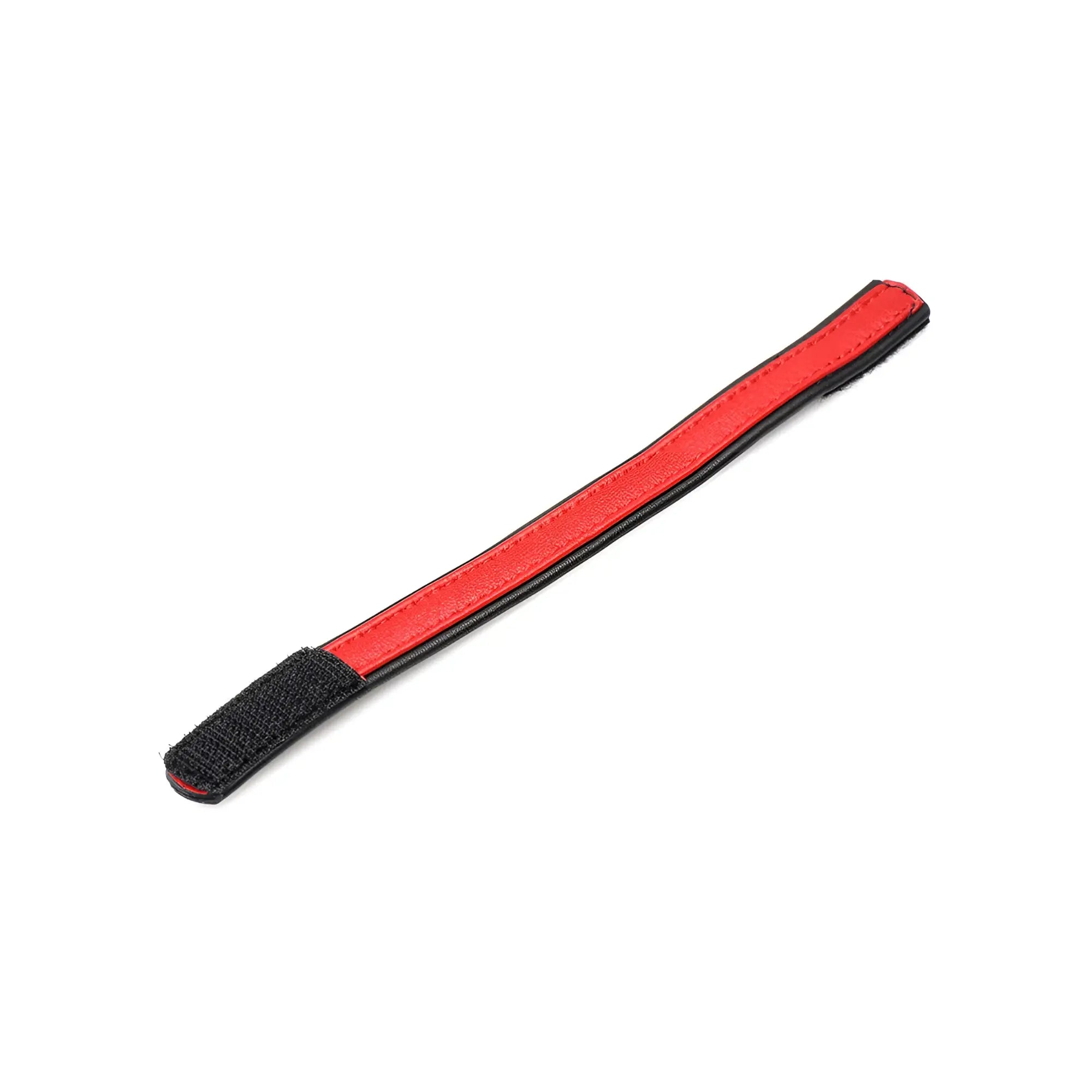 Red leather cock ring with black trim and velcro ends for adjustable secure fit