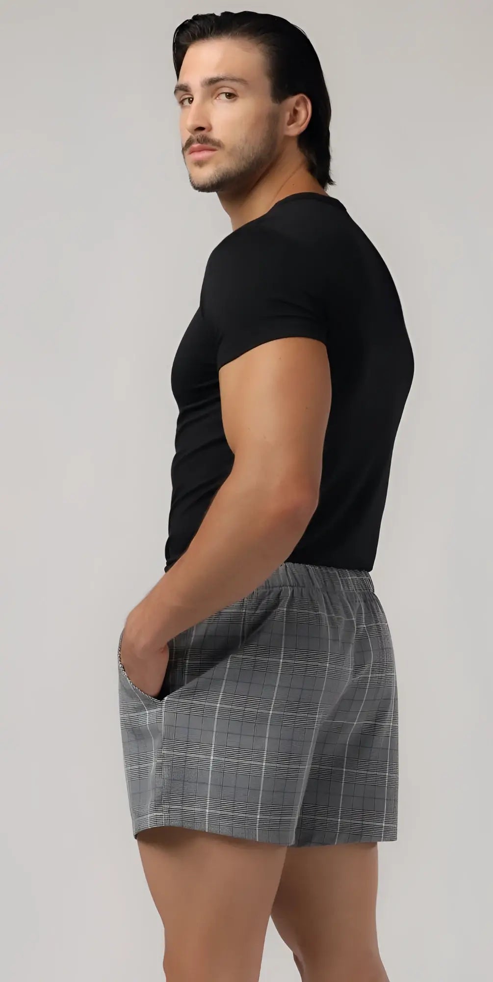 Gray plaid relax boxer with pockets made of soft breathable fabric and elastic waistband for comfortable wear