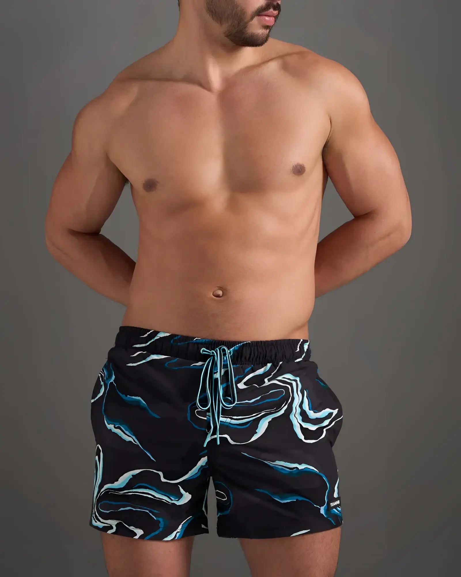 Resort swim short black swim trunks with blue and white marble pattern elastic waistband and matching drawstring