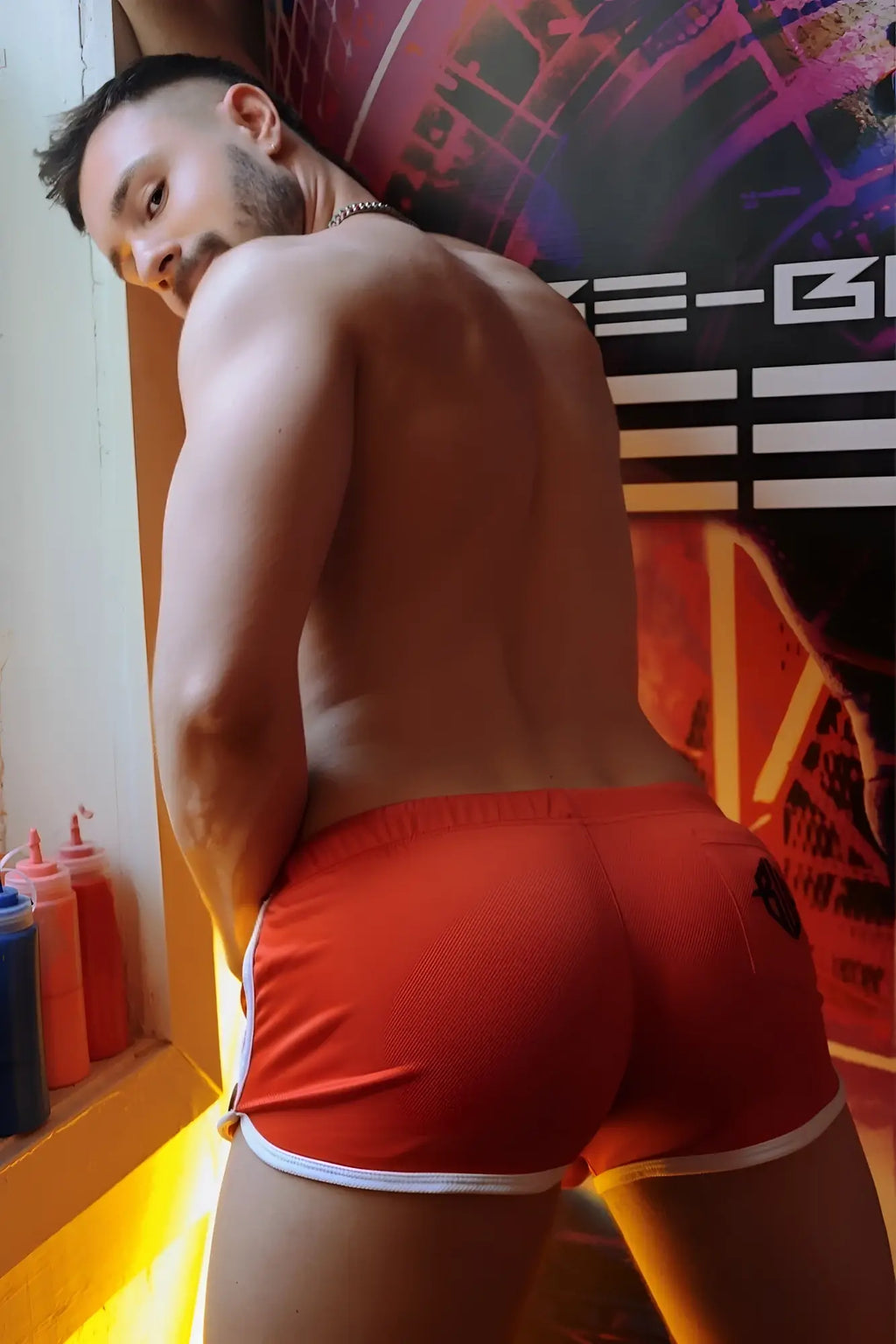Retro remix shorts back view bright red athletic shorts with white trim and small black logo ideal for workouts