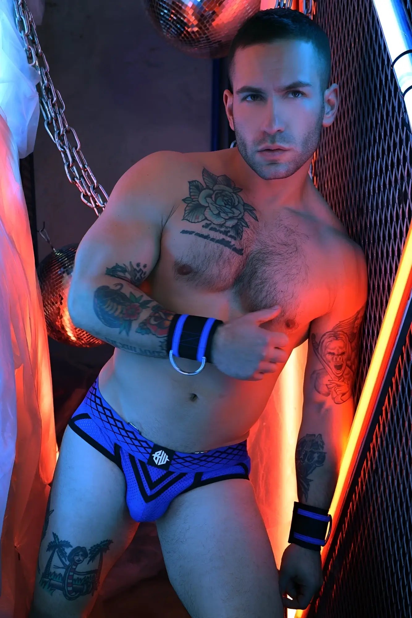 Blue mesh revolution brief with black trim and silver logo on the front featuring breathable lightweight fabric