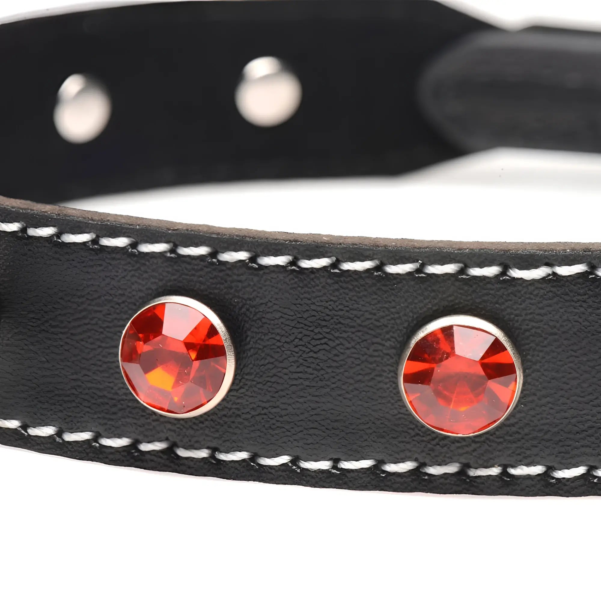 Black leather rhinestone choker with o-ring featuring two red rhinestones in silver frames and white stitching