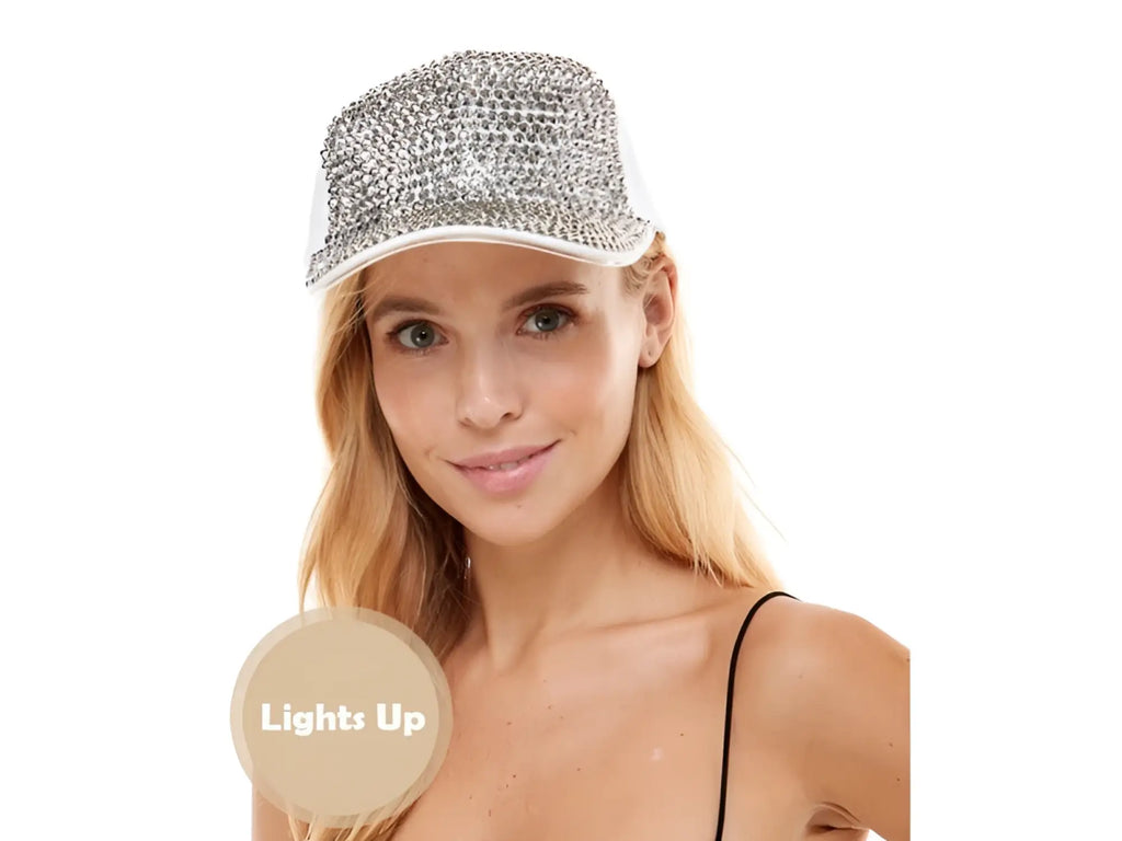 White baseball cap with silver rhinestone embellishments and light up feature in rhinestone light up cap design