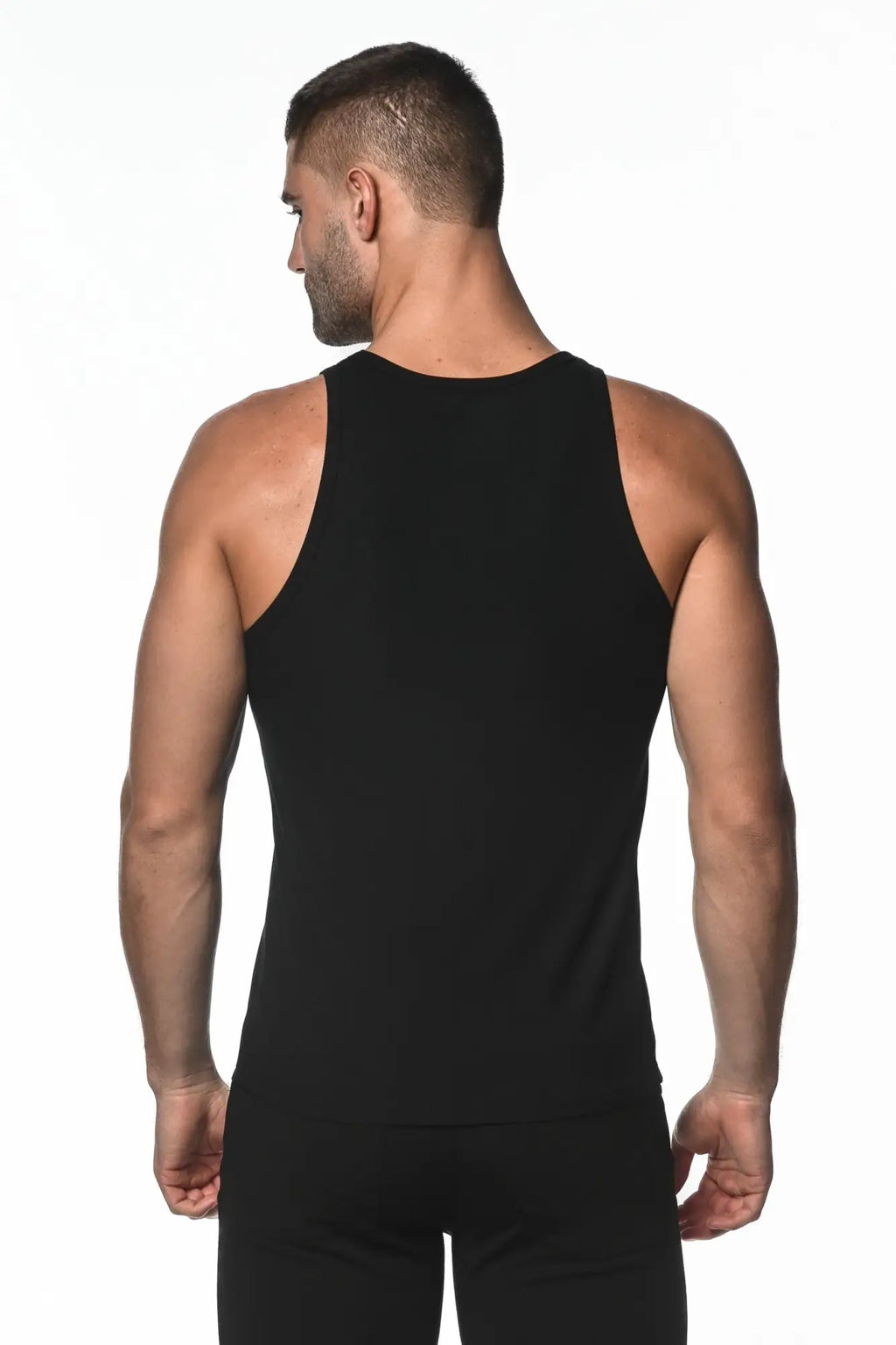Black sleeveless rib modal tank top with rounded neckline and seamless construction for athletic wear