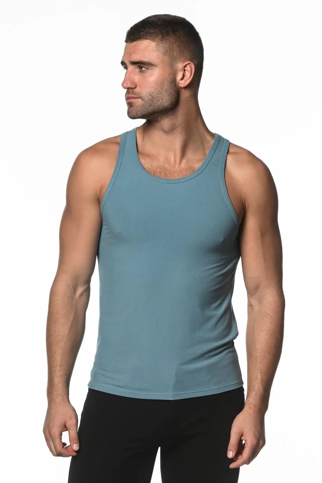 A sleek rib modal tank top in teal with ribbed texture round neckline and fitted silhouette for casual wear