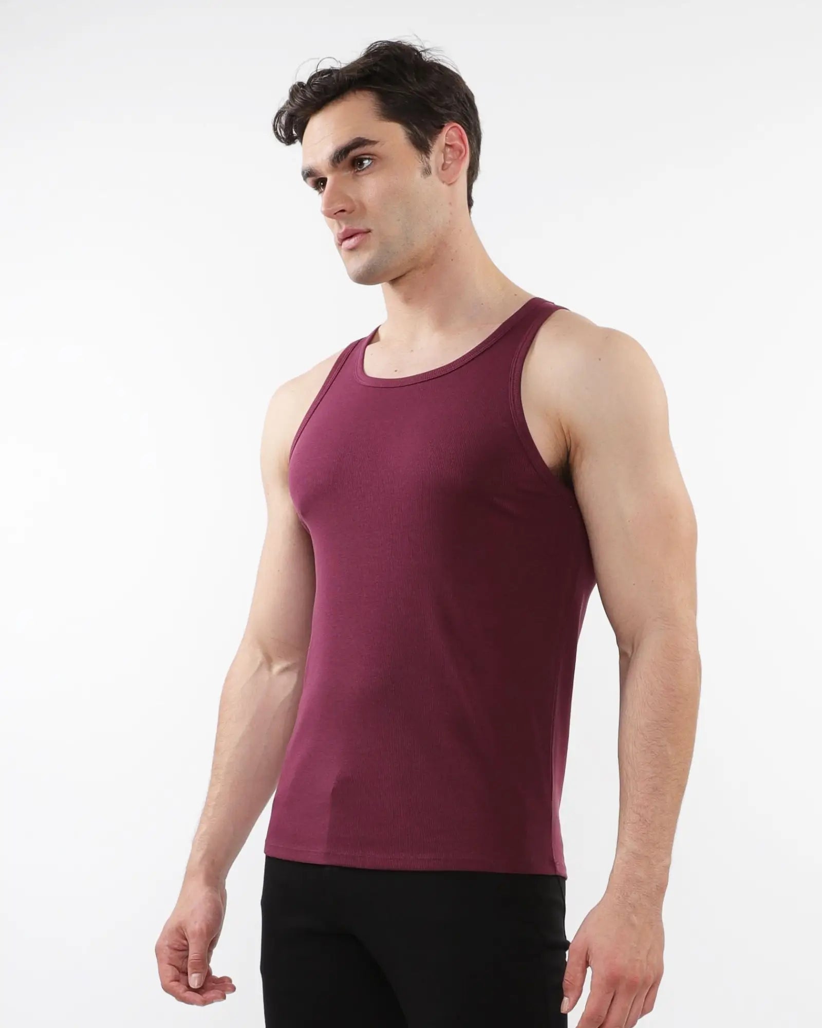 A maroon rib stretch tencel cotton tank top with sleeveless design and a simple round neckline