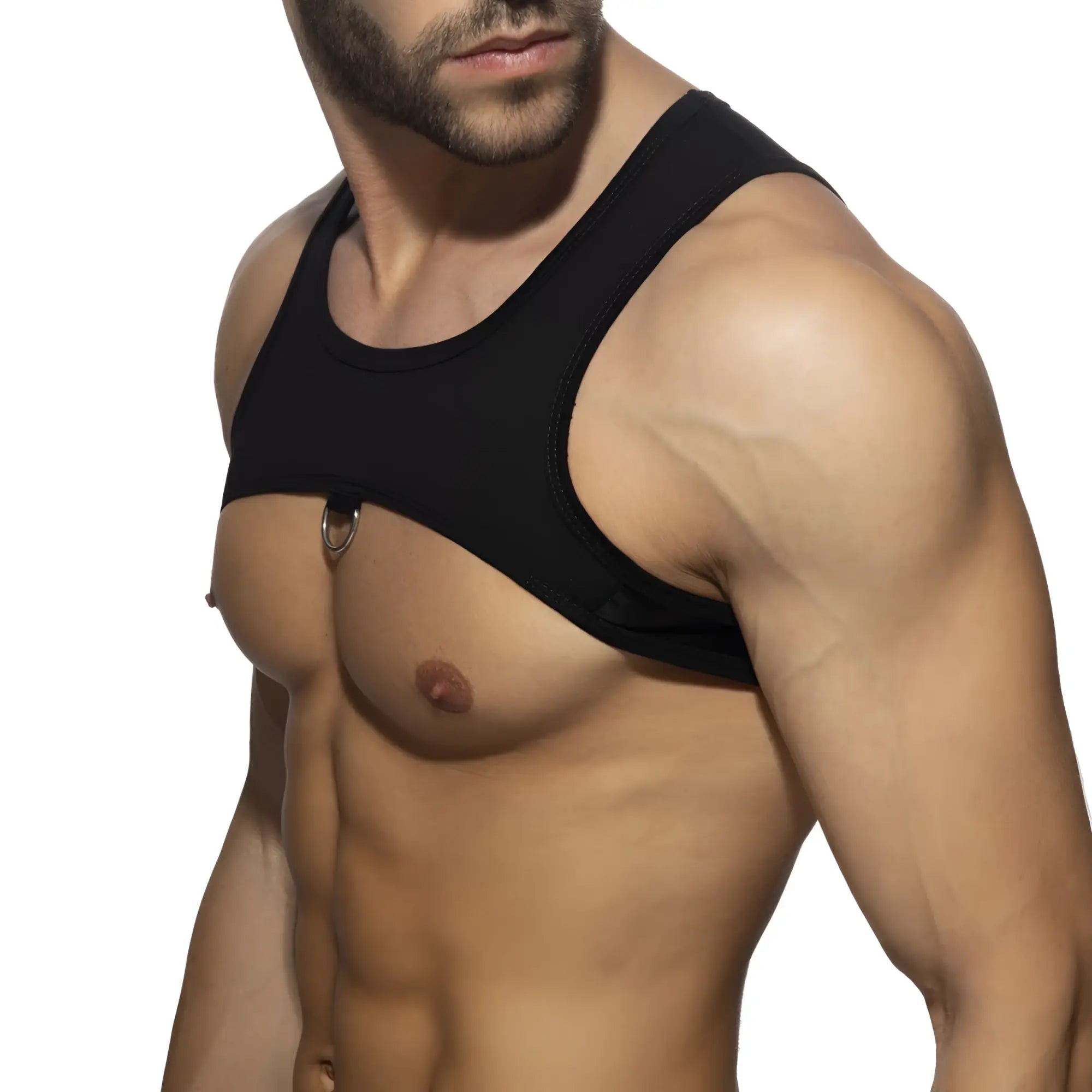 Black sleeveless top ring plan harness with metallic ring detail at center front for edgy streetwear looks