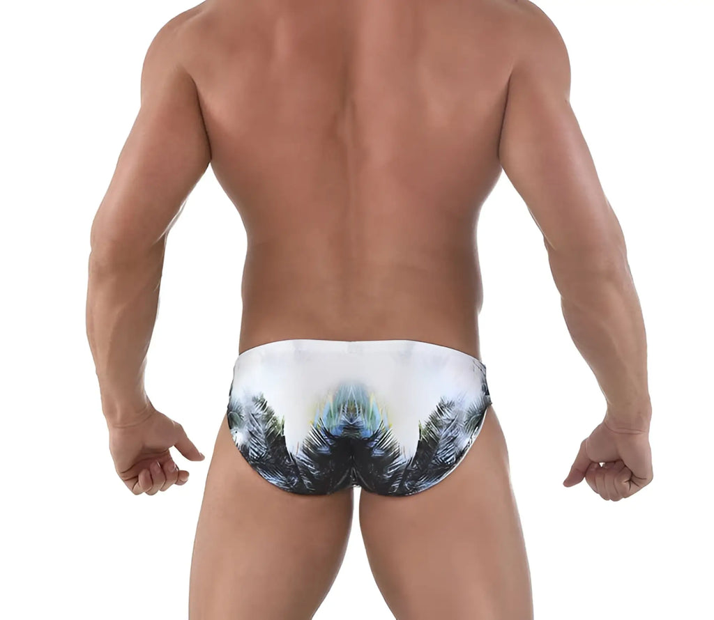 White Roberto Lucca palm tree print swim trunks with symmetrical black green and blue tropical design size 2XL