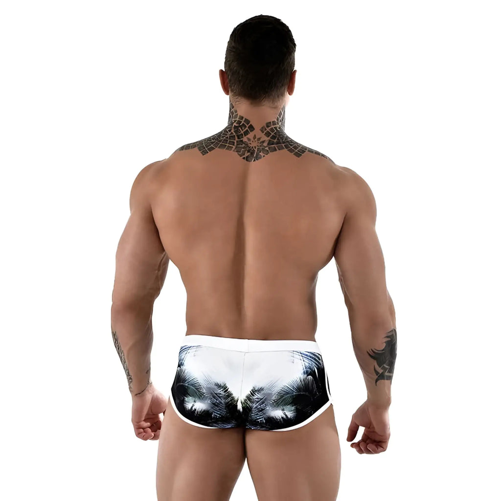 White swim trunks with black and gray palm tree print from roberto lucca square cut trunk swimwear size 2xl