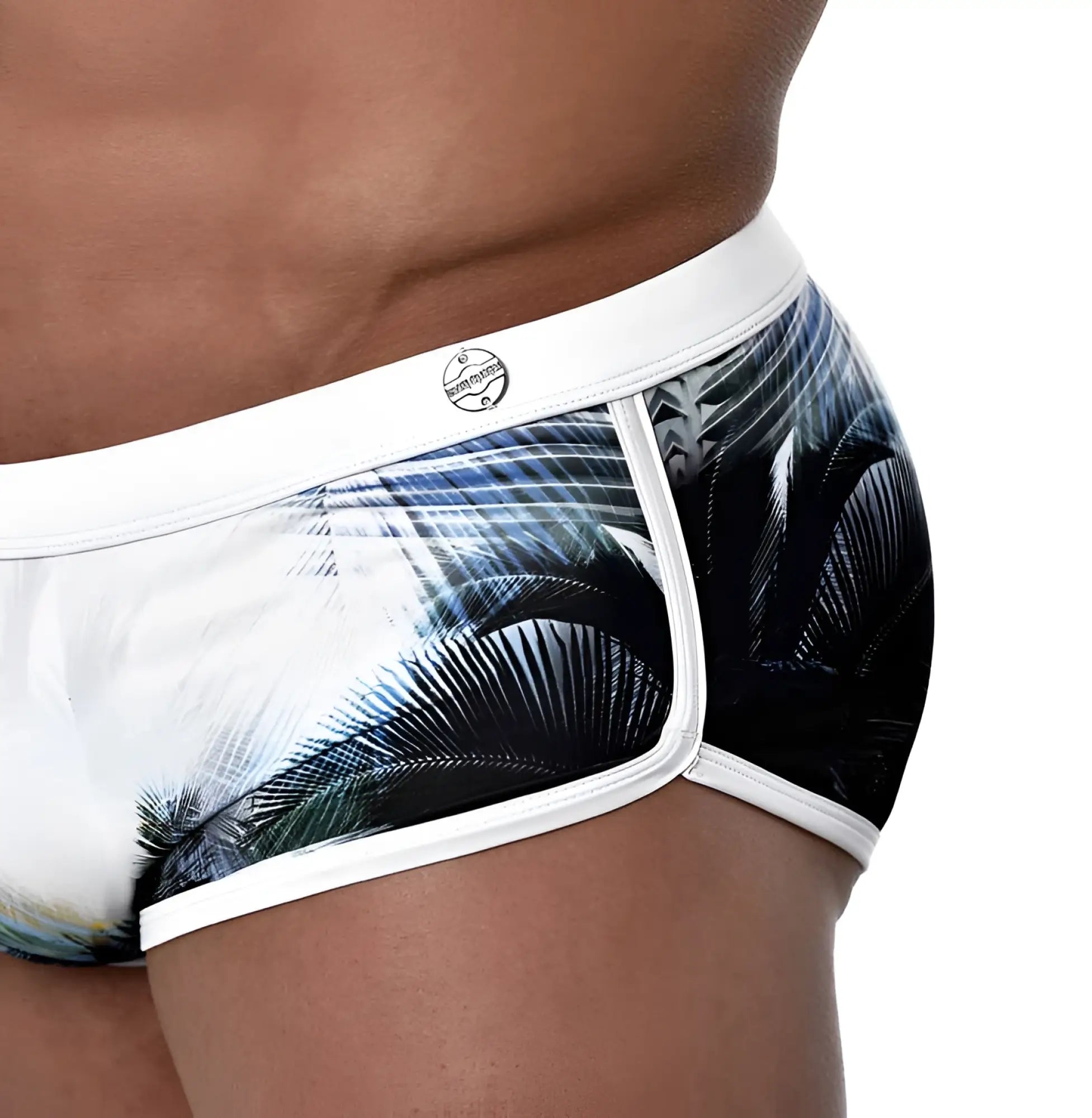 White briefs with bold black and blue palm leaf print and white trim Roberto Lucca swimwear size 2XL