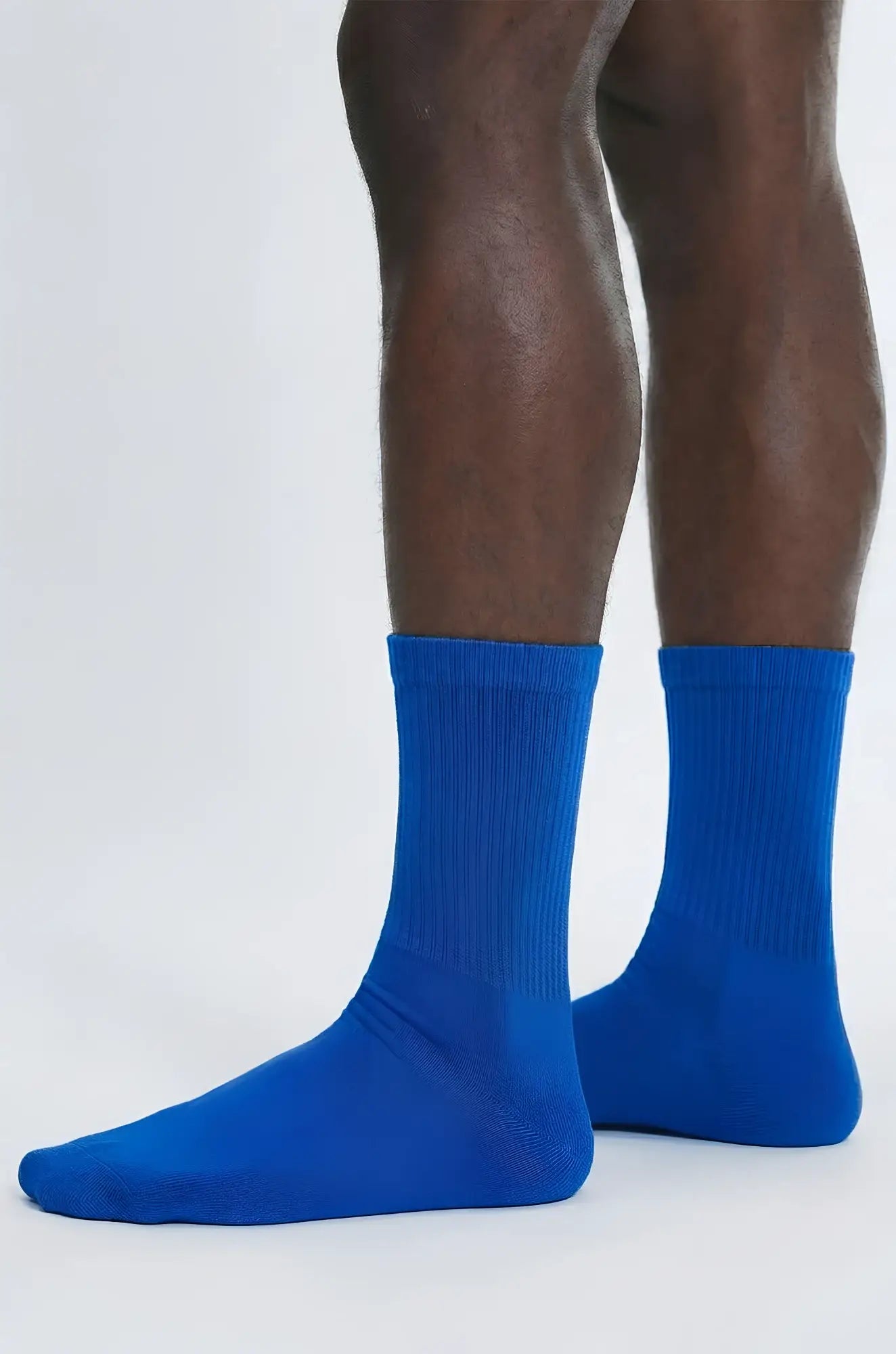Royal blue crew sock featuring bright blue ribbed cuff and smooth seamless body for comfortable wear