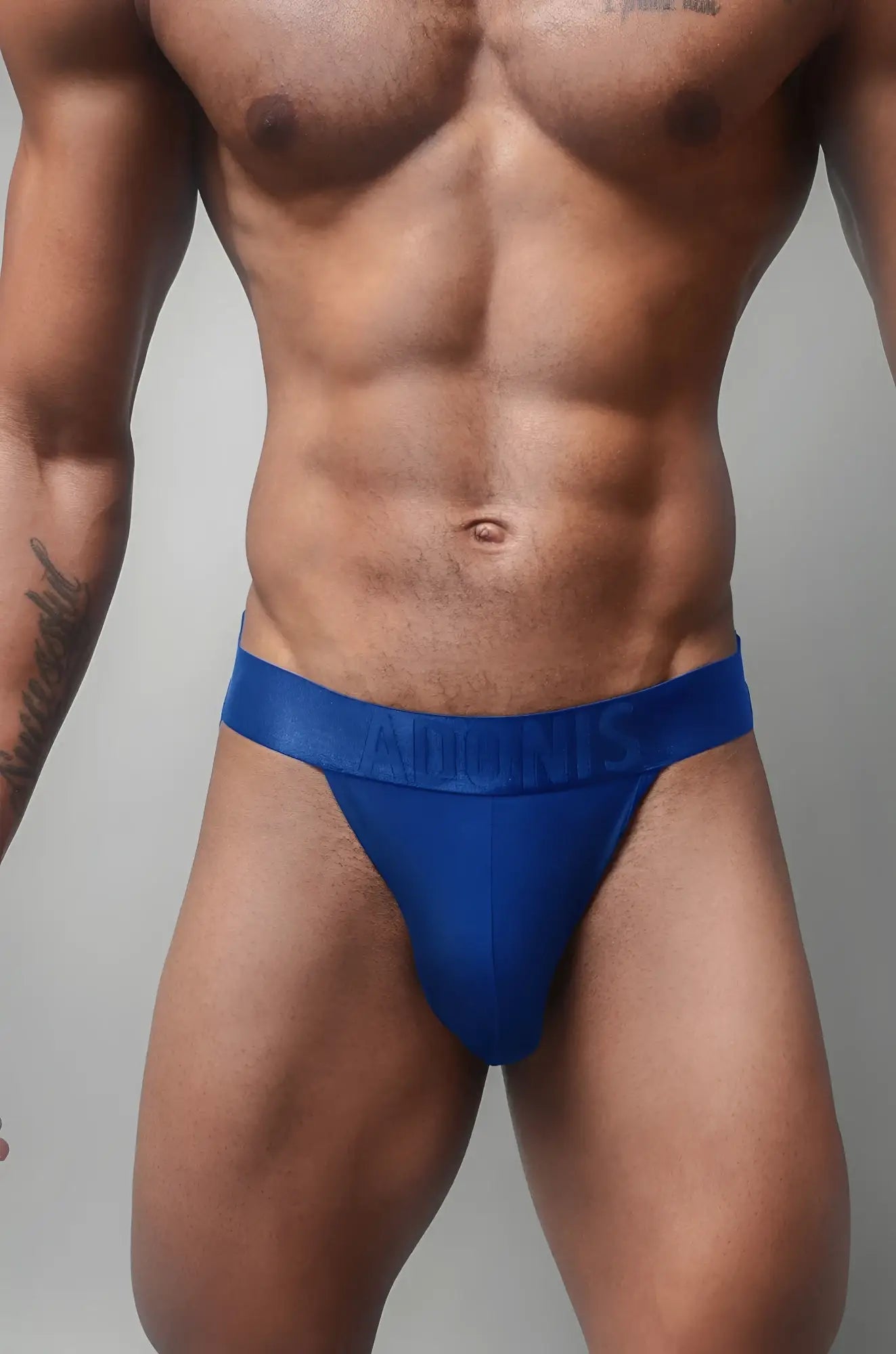 A vibrant royal blue dual jock athletic brief with smooth stretchy fabric and adunis embossed waistband