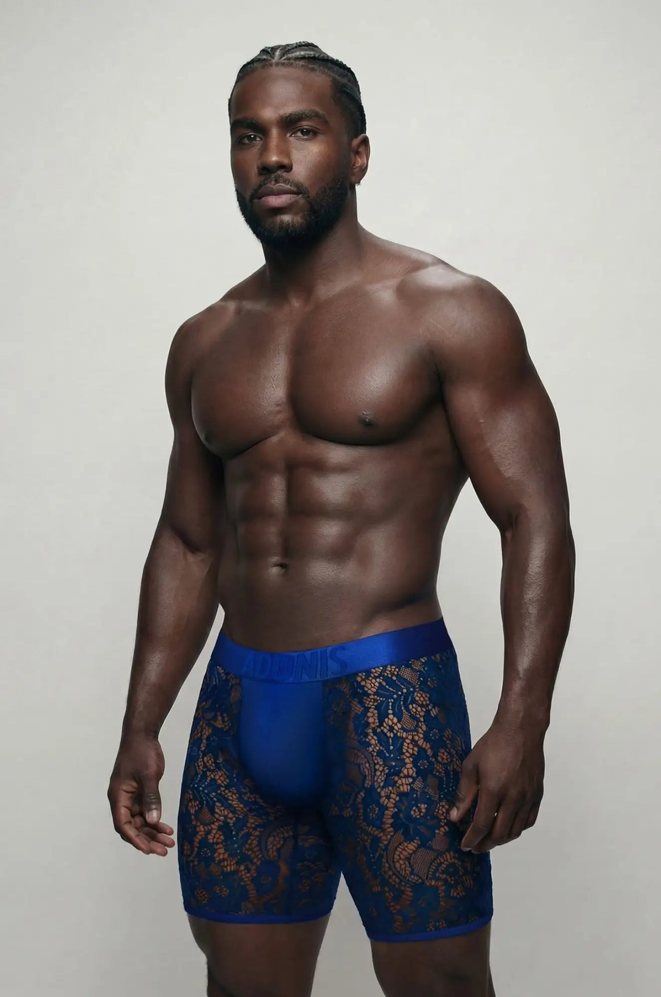 Royal blue sheer lace boxer brief with solid blue waistband showcasing delicate lace fabric and comfortable fit