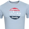 Light blue heathered cotton ruff riders superior brand short sleeved t shirt with distressed circular graphic