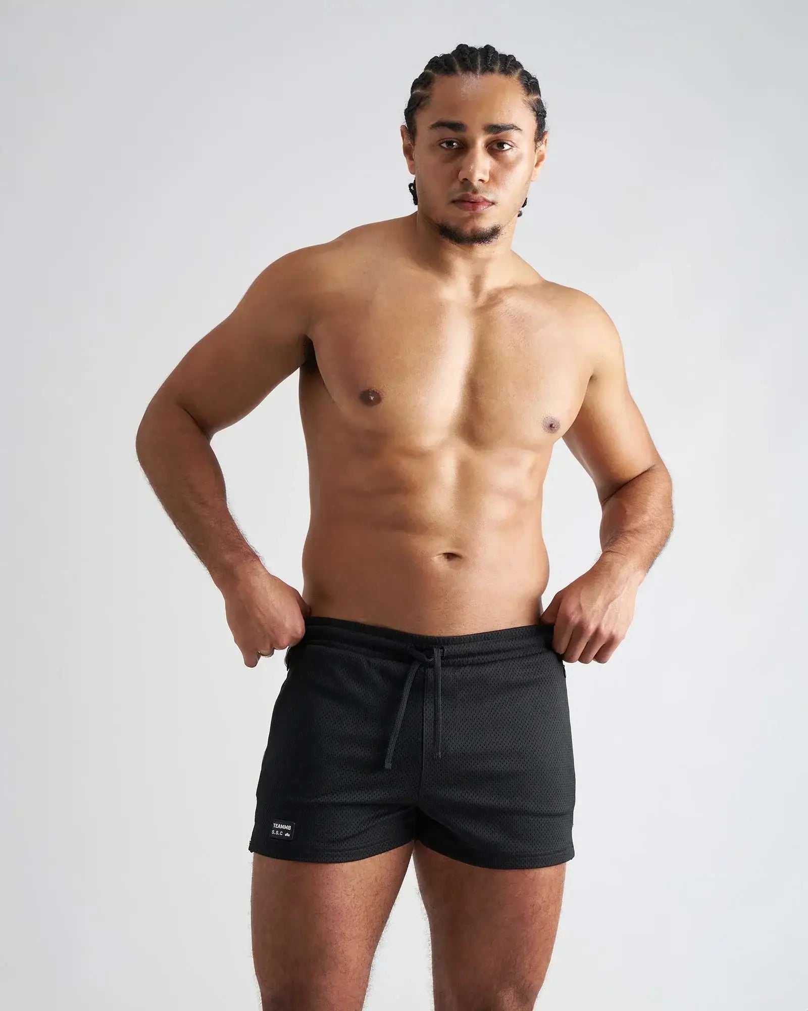 Black mesh athletic shorts with a drawstring waistband and small logo on the lower left leg s s c fraternity 3 mesh short